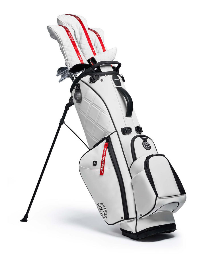 SAYA White Leather Golf Bag with Red Tags. Golf Clubs with White and Red Stripe Head Covers. 