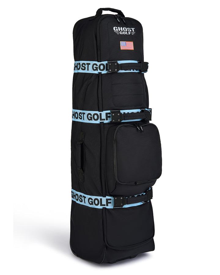 Three-quarter view of the Striker Secondary AWOL Travel Bag showcasing Ghost Golf embroidery across the top panel and an embroidered USA flag detail. Angled product image highlighting the bag’s premium construction, travel-ready design, patriotic accents, and signature Ghost Golf craftsmanship. #color_black