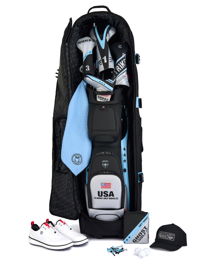 Front product shot of the Striker Secondary AWOL Travel Bag showcasing a Striker golf bag and golf accessories stored inside. Clean front-facing image highlighting the spacious storage capacity, premium travel-ready design, and signature Ghost Golf craftsmanship. #color_black