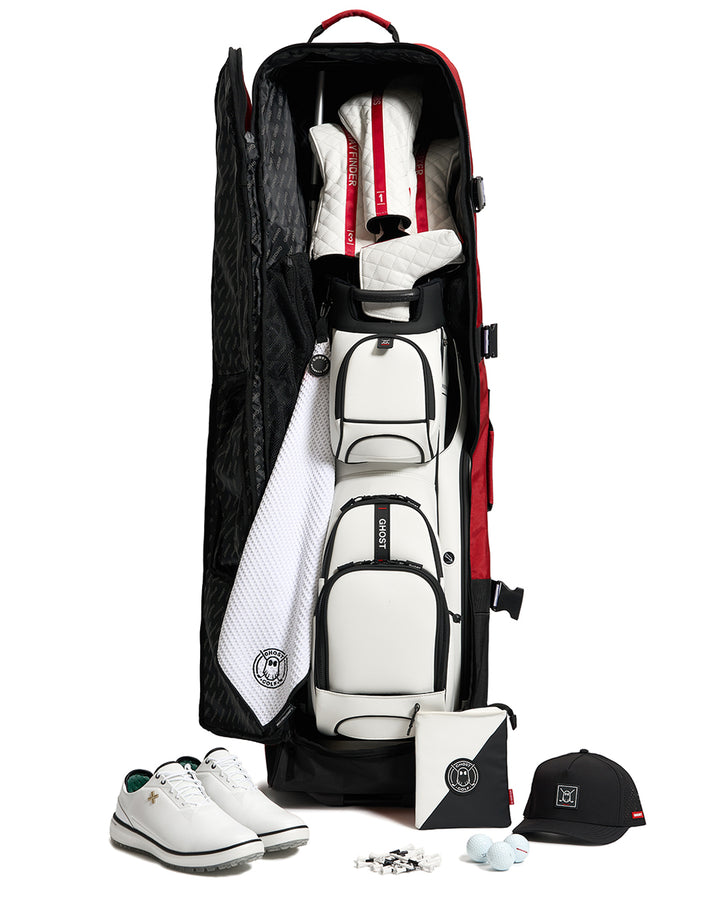 Open View of Red AWOL Travel Bag showcasing golf bag, golf accessories, golf shoes in white #color_red