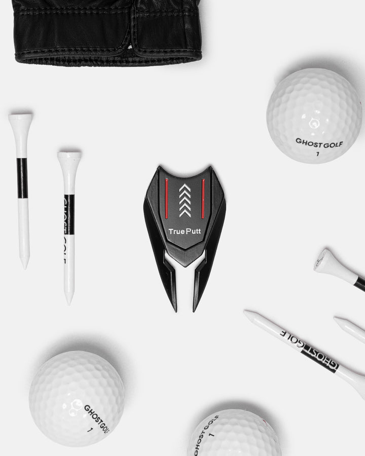 Divot Tool Black Creative Shot with Golf Balls, Tees and Glove#color_black