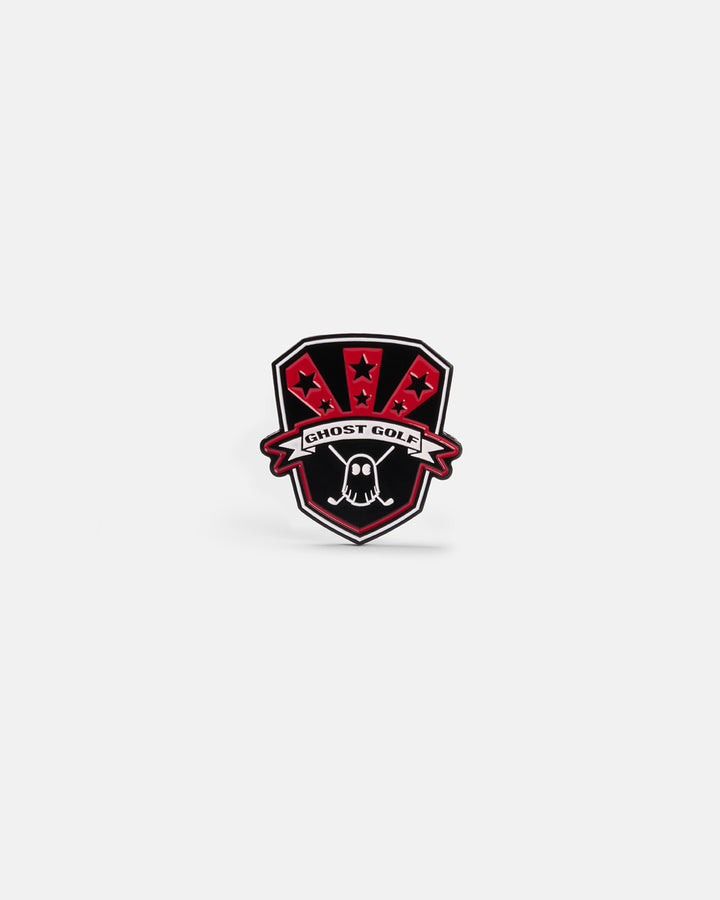 Product photo of black shield-shaped marker with red accents displaying the Ghost Golf name and logo.