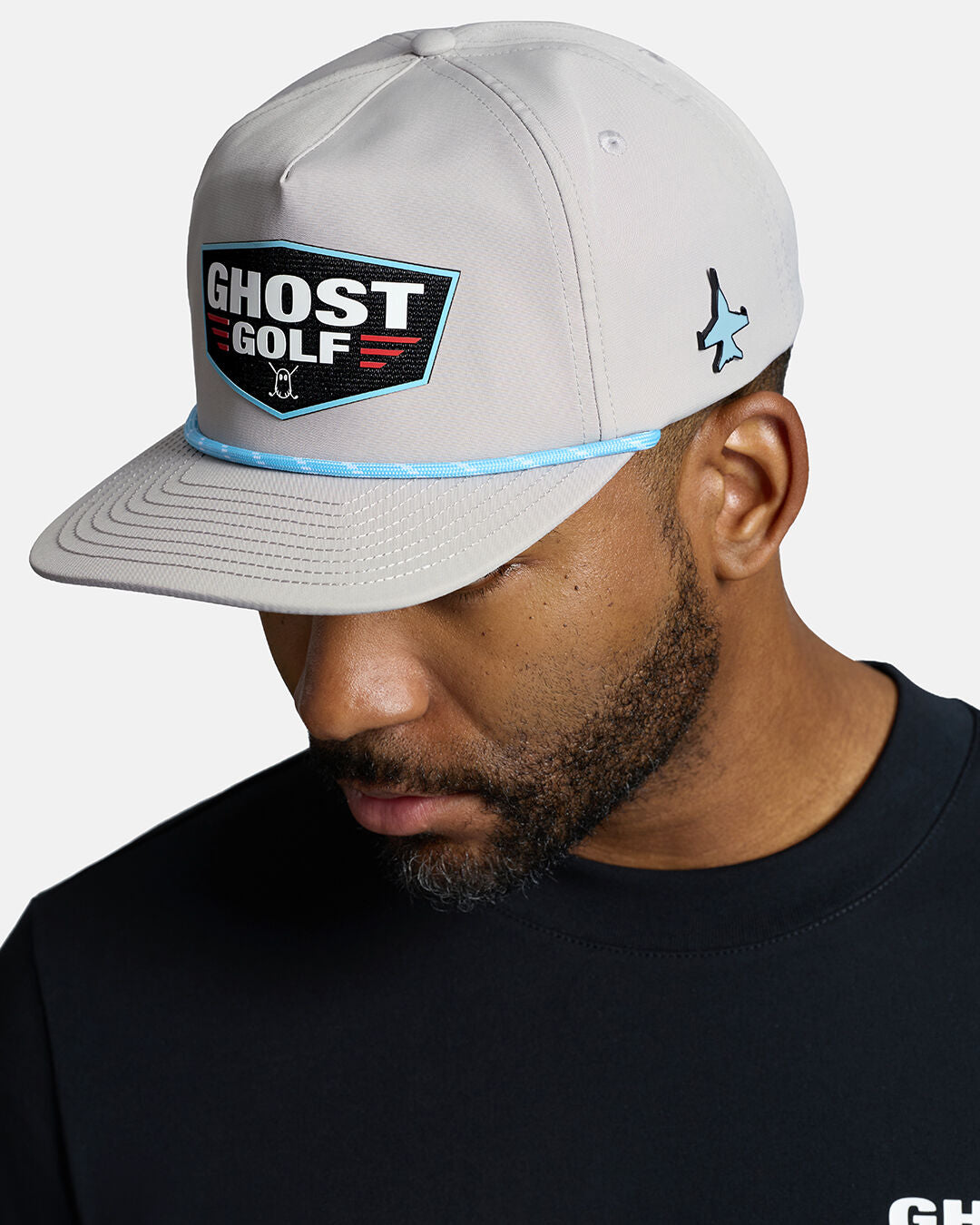 Black Male Model Wearing Grey Flight Hat wearing black t-shirt #color_grey