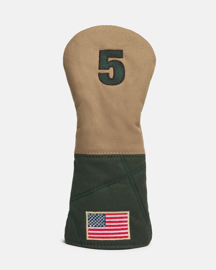 Front product shot of the G-Suit Tertiary 5 Wood Head Cover featuring an embroidered number "5" at the top and an embroidered USA flag at the bottom. Clean front-facing image highlighting the premium materials, patriotic detailing, and signature Ghost Golf craftsmanship inspired by military aviation design. #size_5-wood