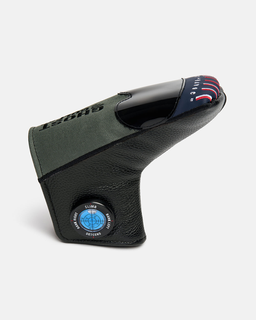Side product shot of the G-Suit Primary Blade Putter Cover, featuring aviation-inspired compass graphics on the side and Capt Havoc typography embroidered across the top. Angled view highlighting the unique aircraft silhouette, premium embroidery, and signature Ghost Golf military-inspired design details.