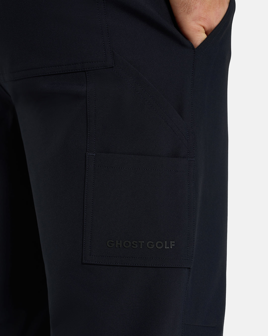 Side Closeup View of Black Ghost Golf Core Jogger Pant on White Male Model with Ghost Golf Logo #color_black