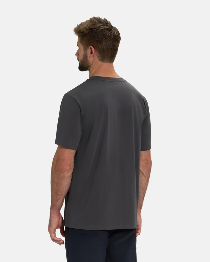 Back View of Iron Grey Ghost Golf Core Logo Tee on White Male Model #color_iron-grey