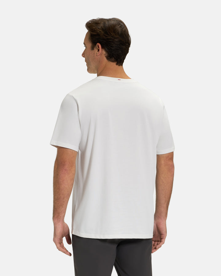 Back View of Optic White Ghost Golf Core Logo Tee on White Male Model #color_white