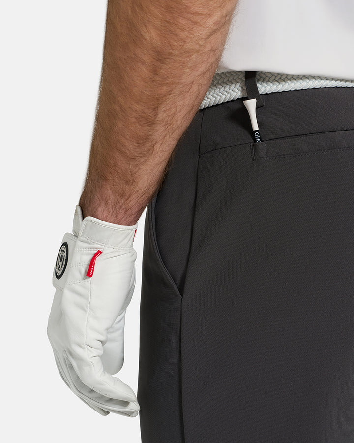 Back Closeup View of Iron Grey Ghost Golf Core Pant on White Male Model #color_iron-grey