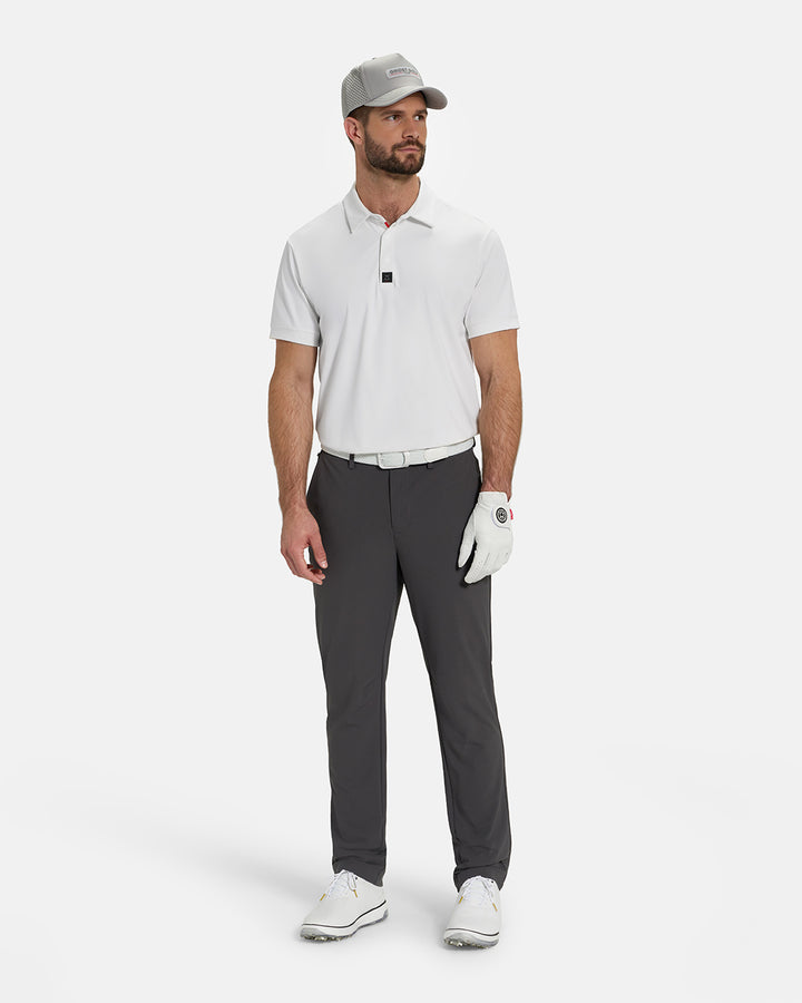 Full Body View of Optic White Ghost Golf Core Polo Tucked on White Male Model wearing grey pants white gloves white belt white shoes and grey hat #color_white