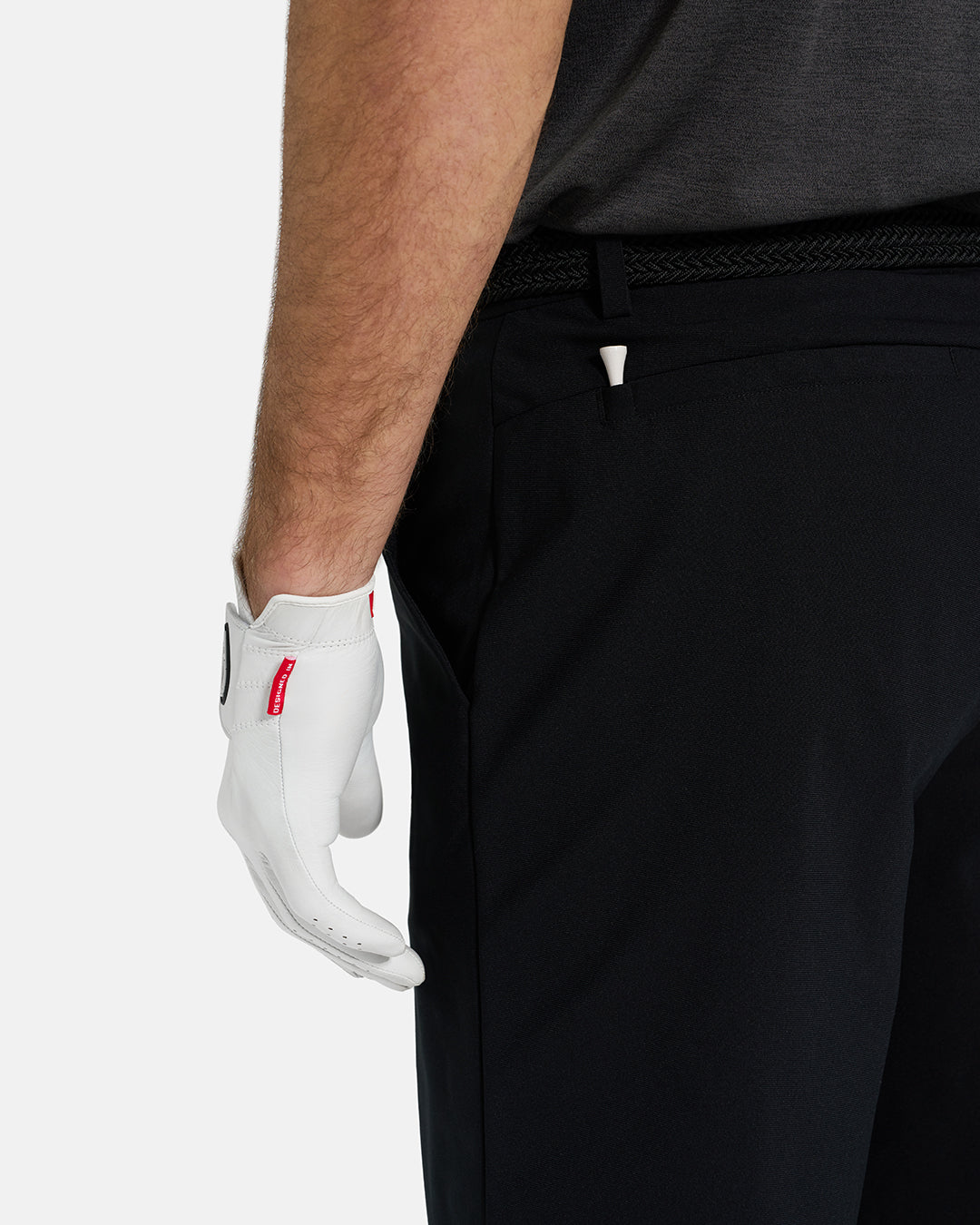 Back Closeup View of Black Ghost Golf Core Short on White Male Model #color_black