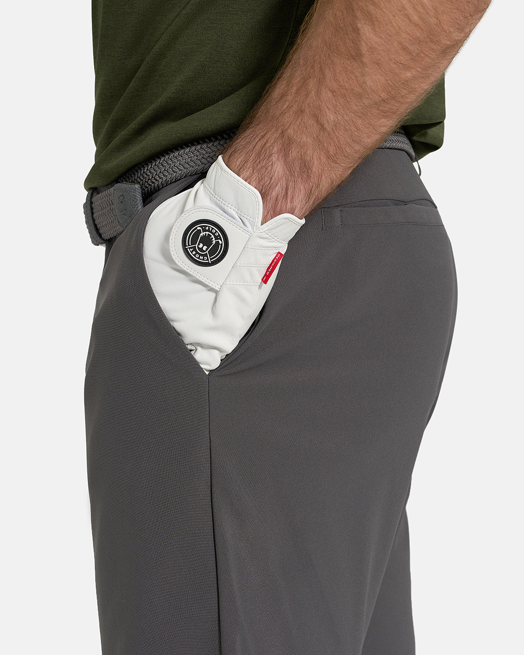 Side Closeup View of Iron Grey Ghost Golf Core Short on White Male Model with hand in pocket #color_iron-grey