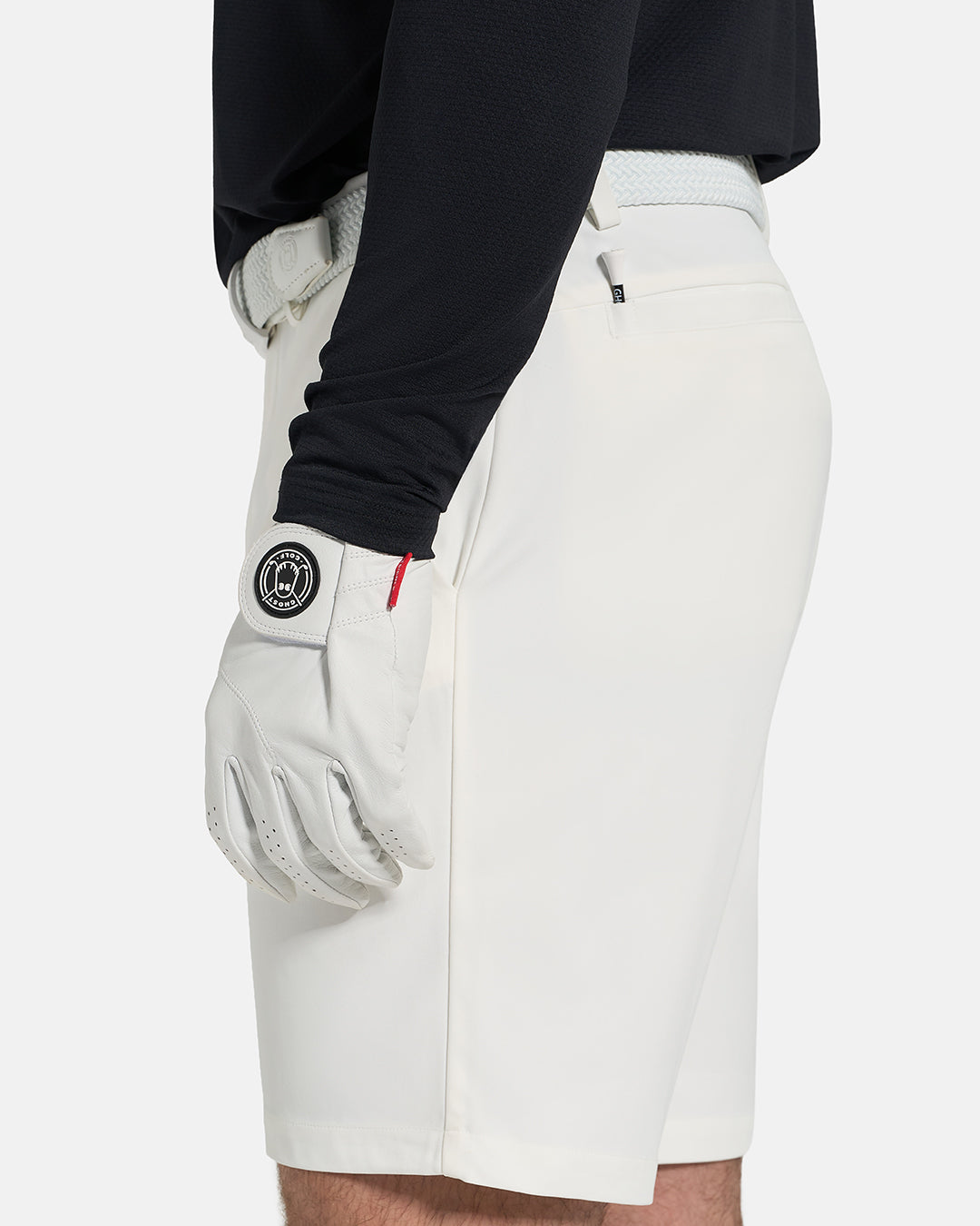 Closeup Side View of White Ghost Golf Core Short on White Male Model #color_white