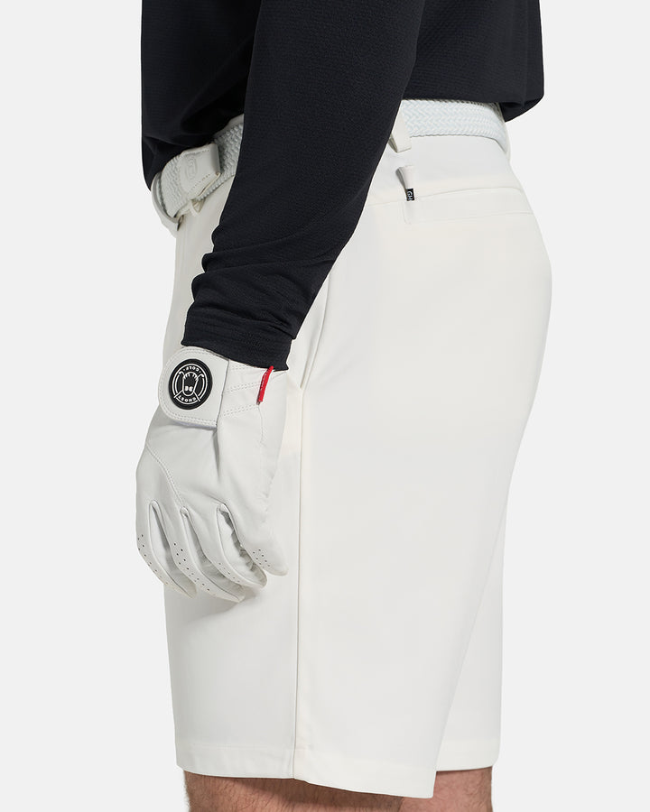 Closeup Side View of White Ghost Golf Core Short on White Male Model #color_white