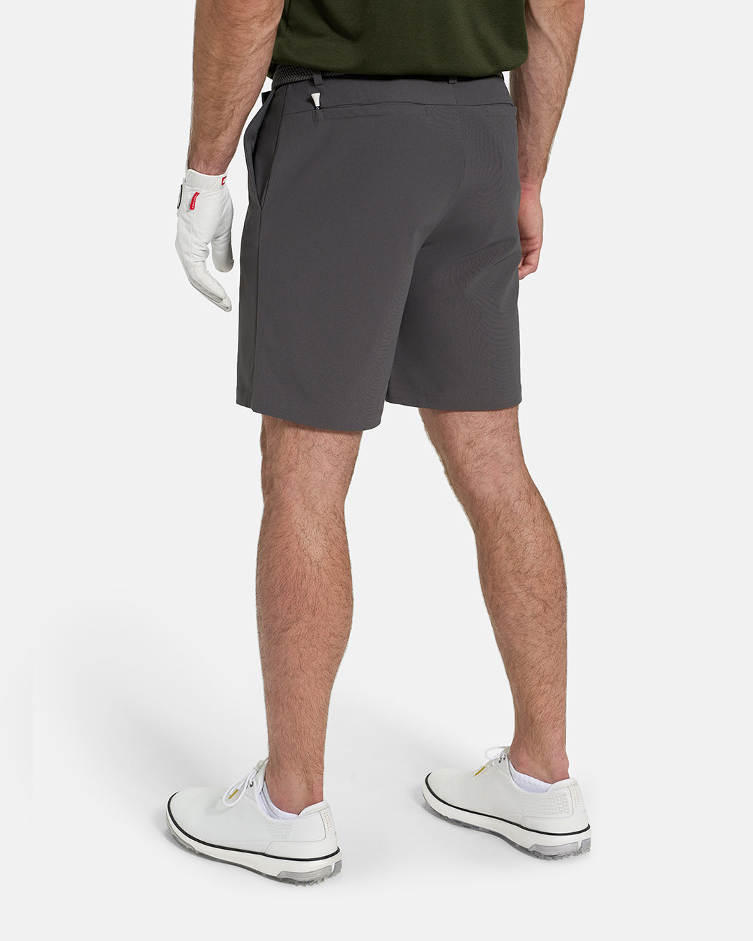 Back View of Iron Grey Ghost Golf Core Short on White Male Model with White Shoes #color_iron-grey