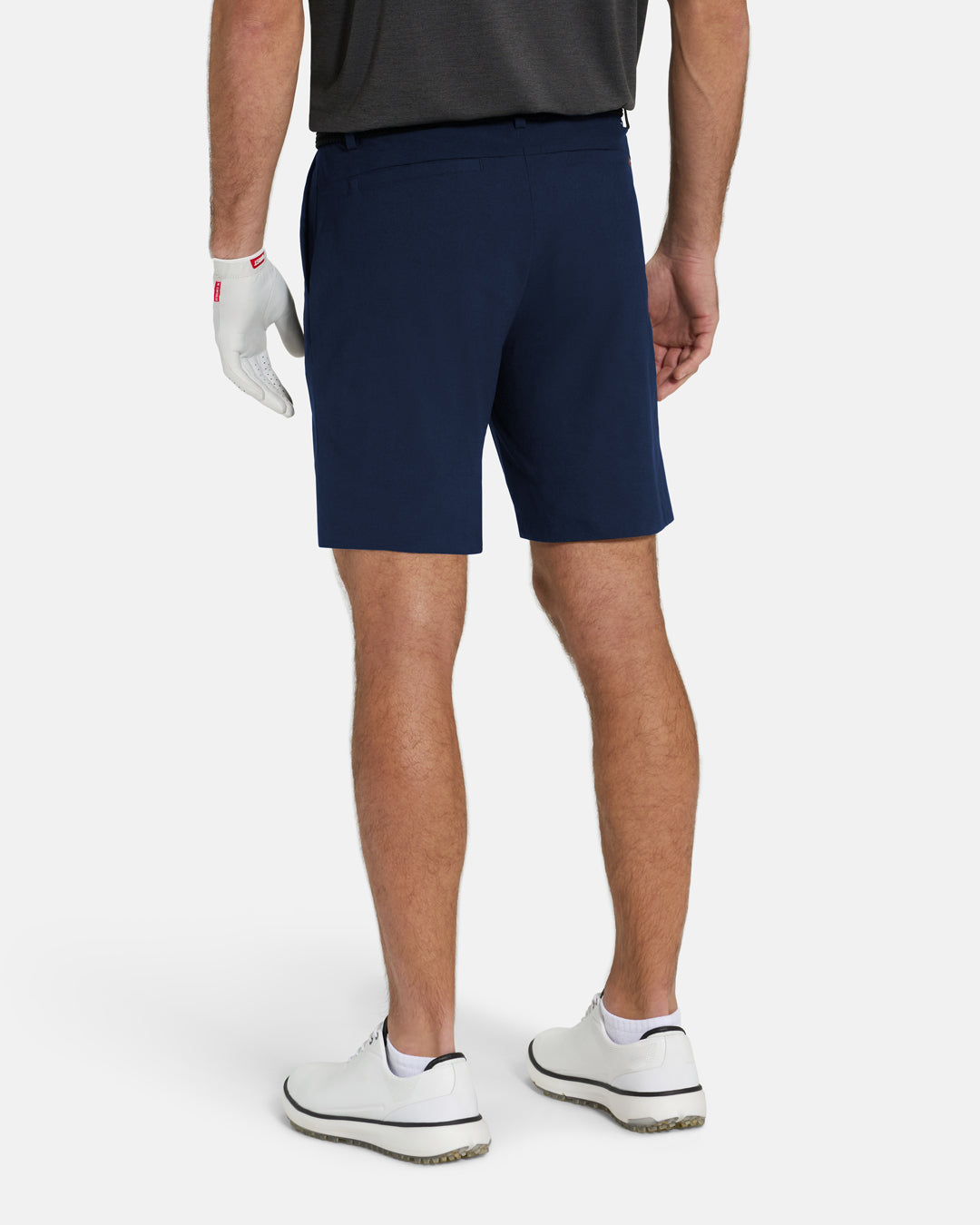Back View of Navy Ghost Golf Core Short on White Male Model #color_navy