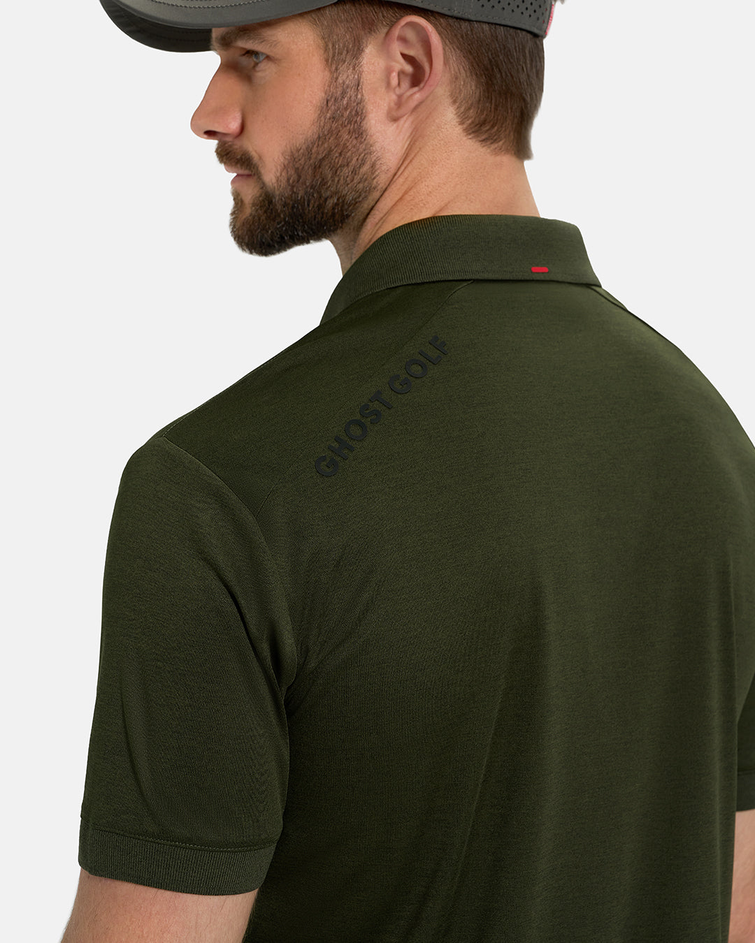 Back Closeup View of Forest Green Ghost Golf Marled Core Polo with Ghost Golf Logo on White Male Model #color_forest-green
