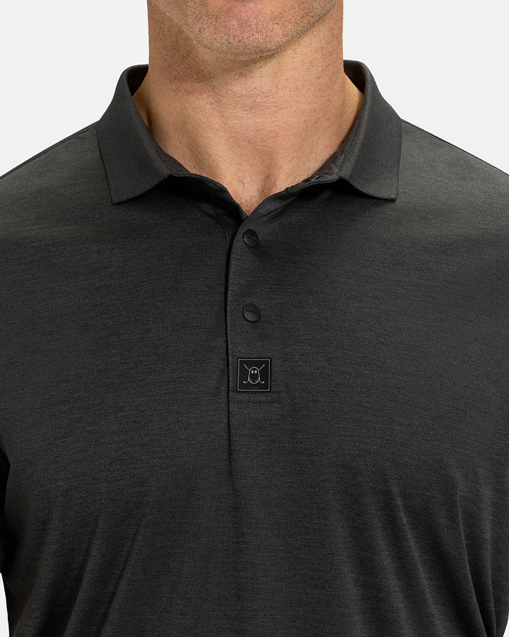 Front Closeup View of Iron Grey Ghost Golf Marled Core Polo on White Male Model #color_iron-grey