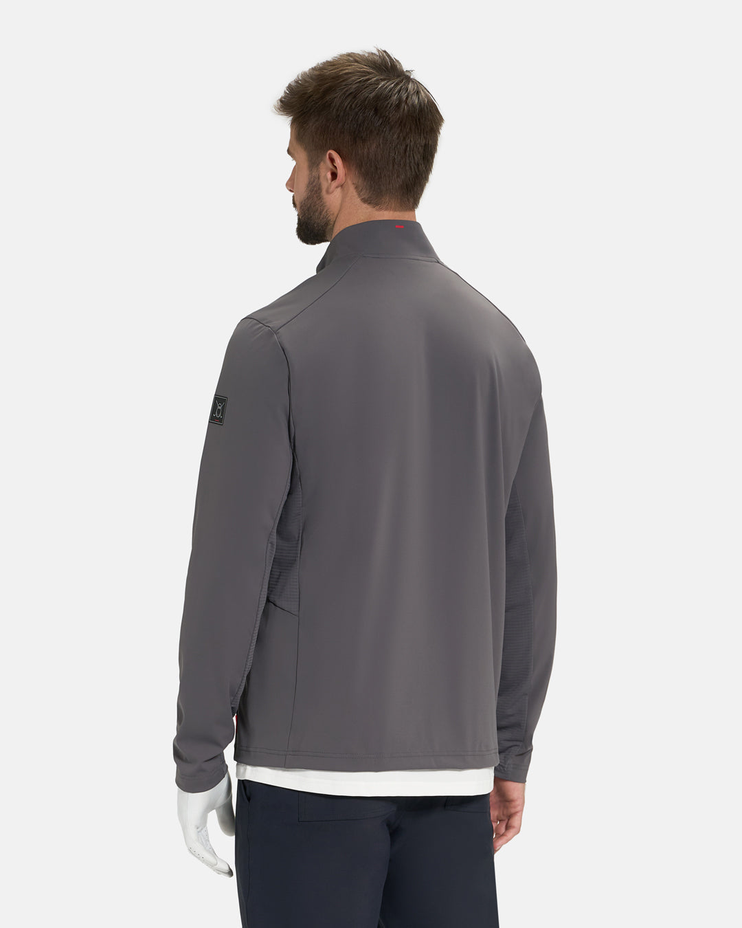 Back View of Iron Grey Ghost Golf Quarter Zip Mock Jacket on White Male Model #color_iron-grey