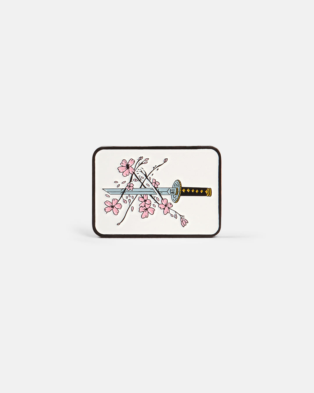 Product photo of a rectangular ball marker featuring a katana and cherry blossom design on an off-white background.