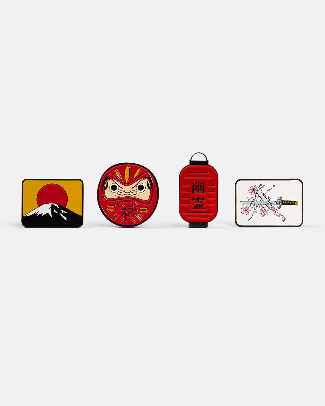 Product photo featuring multiple Japanese-themed ball markers, including designs of Mount Fuji, a Daruma doll, a red lantern with Japanese characters, and a katana with cherry blossoms.
