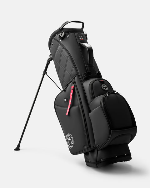 GHOSTGOLF Anyday Katana golf bag in black, standing on its integrated leg stand