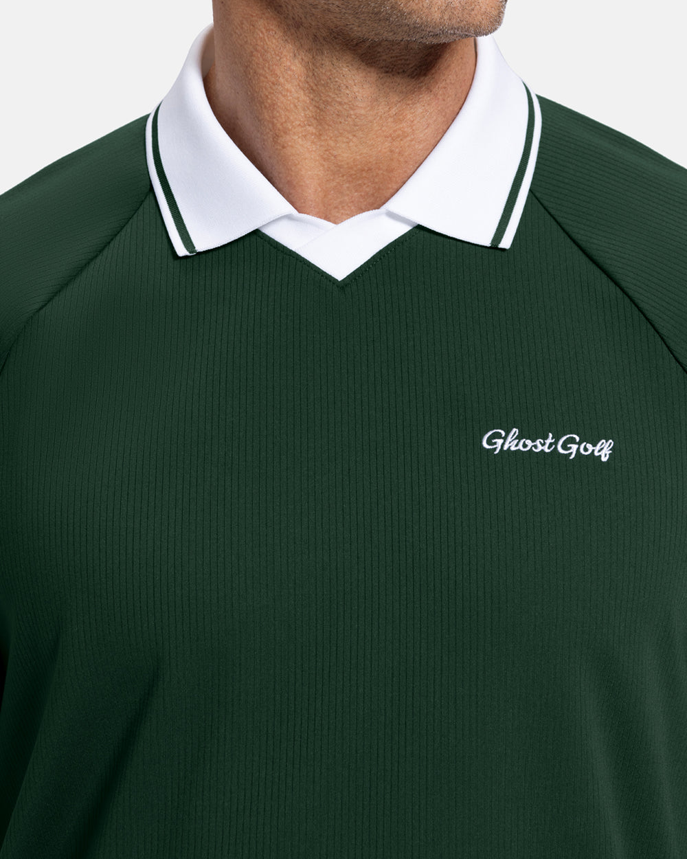 Closeup Front View of Bogey Green Patrons Heritage Polo on white male model showing ghost golf graphic hit #color_bogey-green