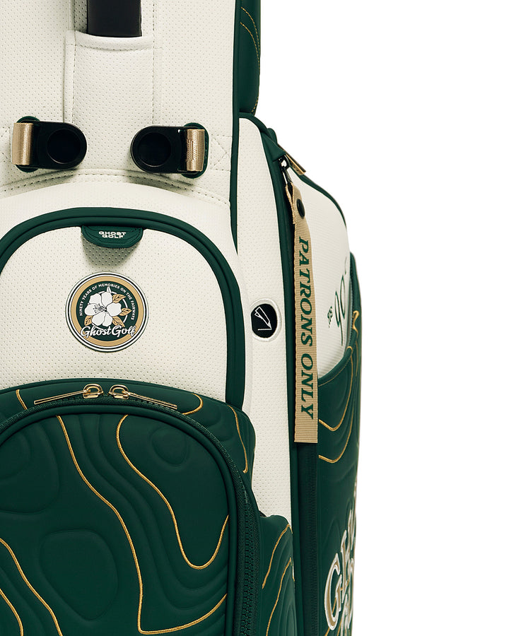 Closeup View of Patrons Only Anday Bag with white and green accents and detail topographic pattern with ghost golf branding #color_green