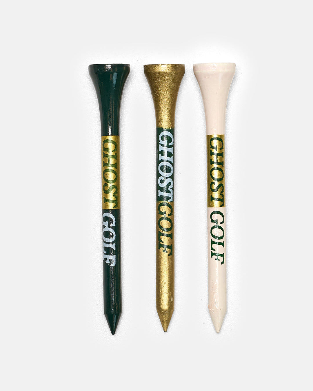 Product Shot of 3 golf tees in white background. In green gold and white colors