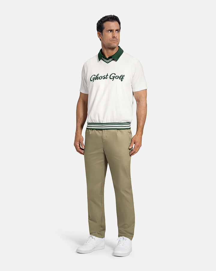 Full Body Front View of White Patrons Sweater Vest on white male model wearing beige pants and white shoes #color_white