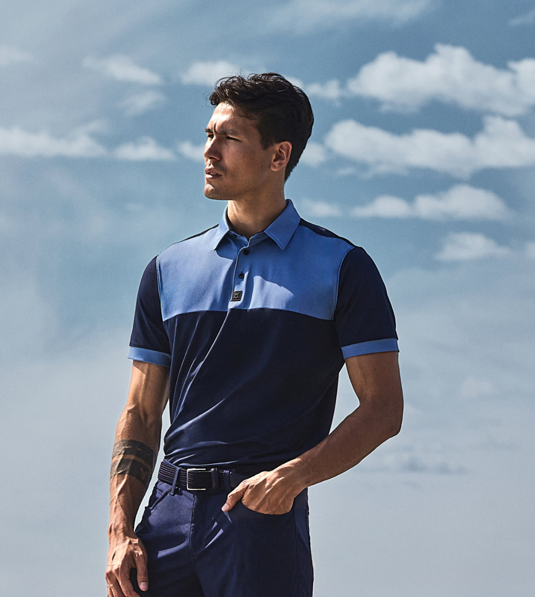 Polo_Collection_Tile_Vertical_Apparel_1_Man Wearing 2 Tone Polo