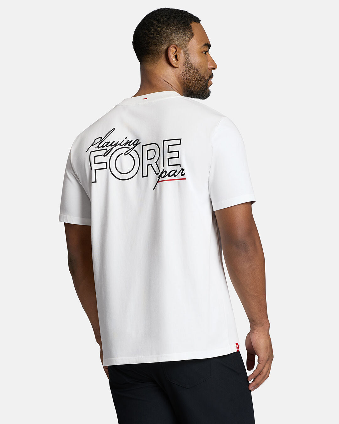 Top Back Body Shot of Black Male Model Wearing White Qualifier Fore Par Tee show casing typographic design on the back. Model is wearing black pants #color_white