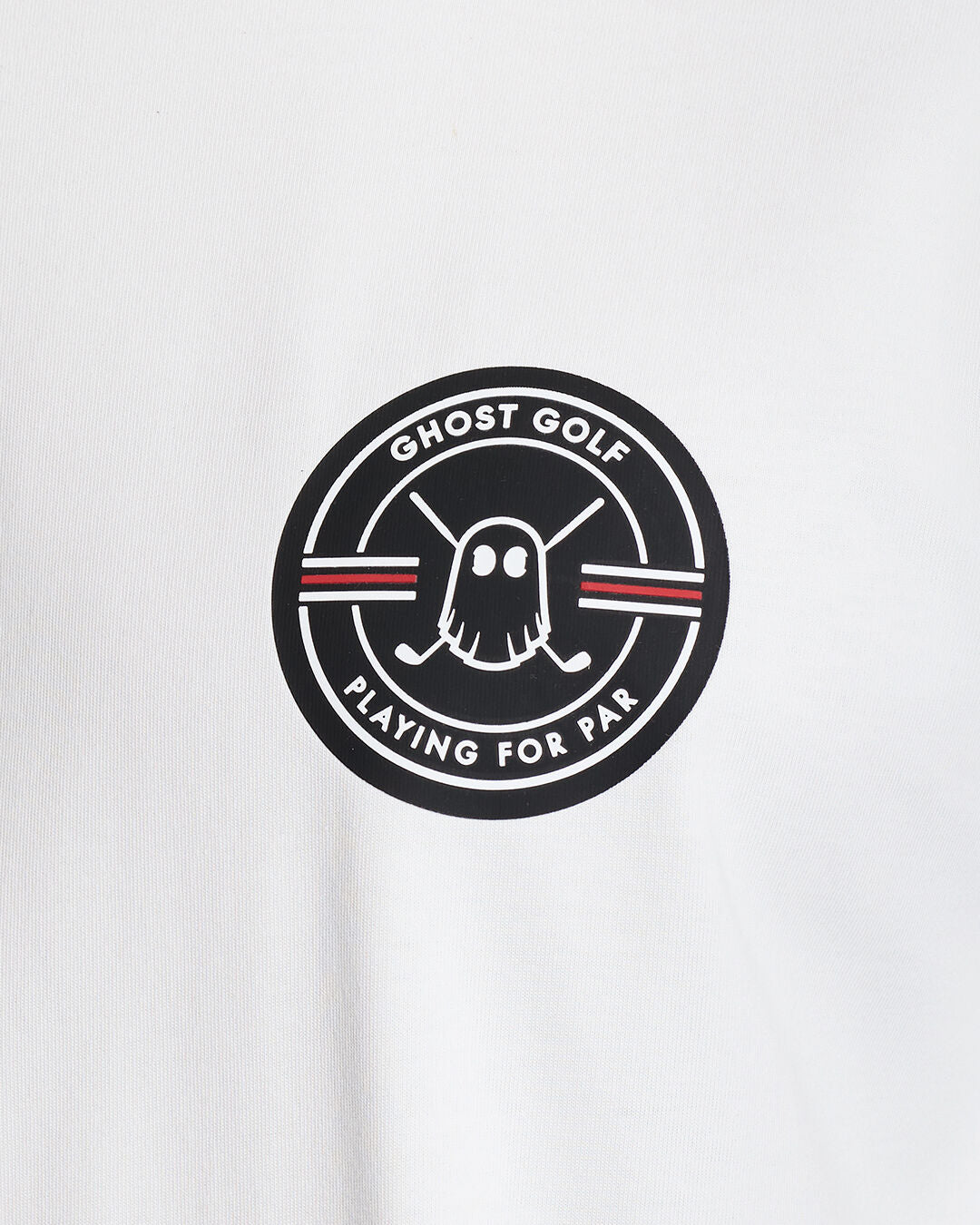 Closeup Shot of White Qualifier Fore Par Tee showcasing emblem artwork on chest #color_white