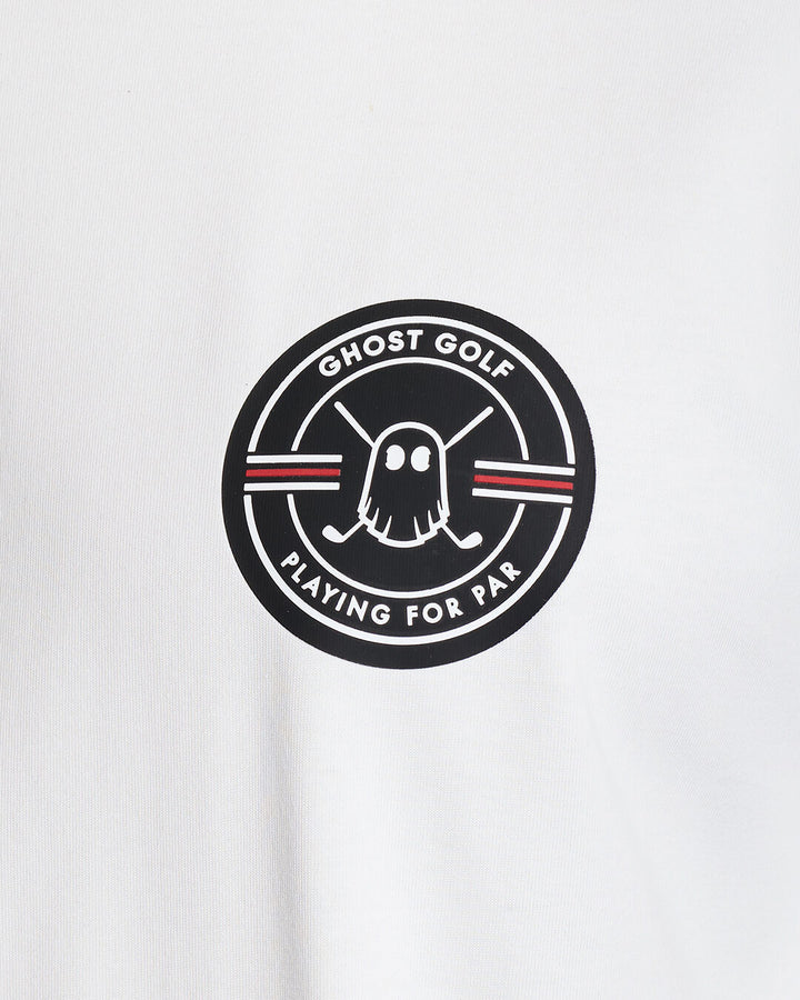 Closeup Shot of White Qualifier Fore Par Tee showcasing emblem artwork on chest #color_white