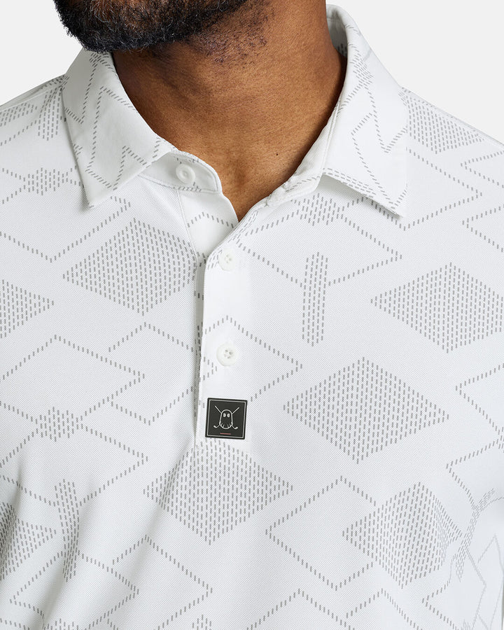 Closeup Front Shot of White Qualifier Argyle Polo showcasing buttons of polo and ghost golf icon #color_white