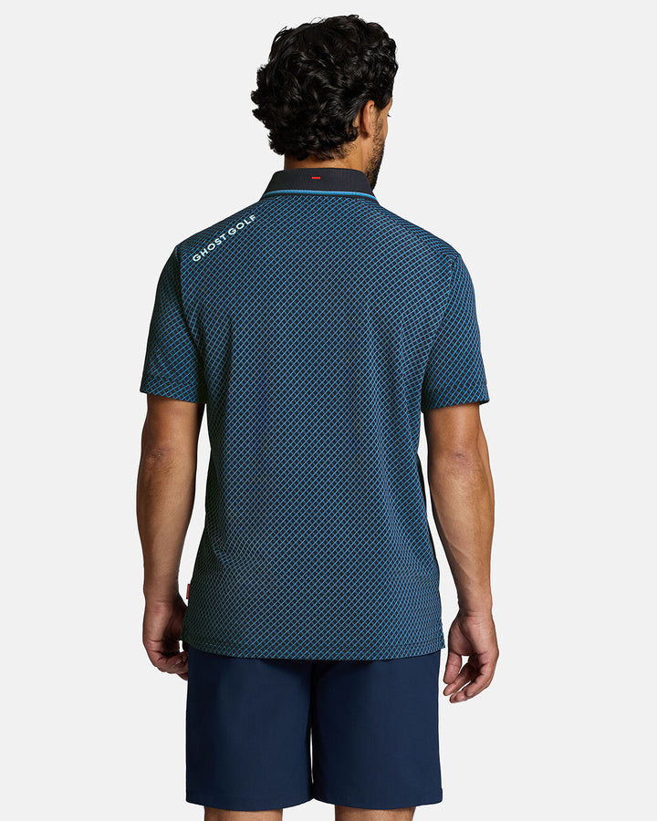 Top Back Body Shot of White Male Model Wearing Dark Navy Qualifier Chase Polo with navy shorts. Ghost Golf Hit on back left shoulder #color_dark-navy
