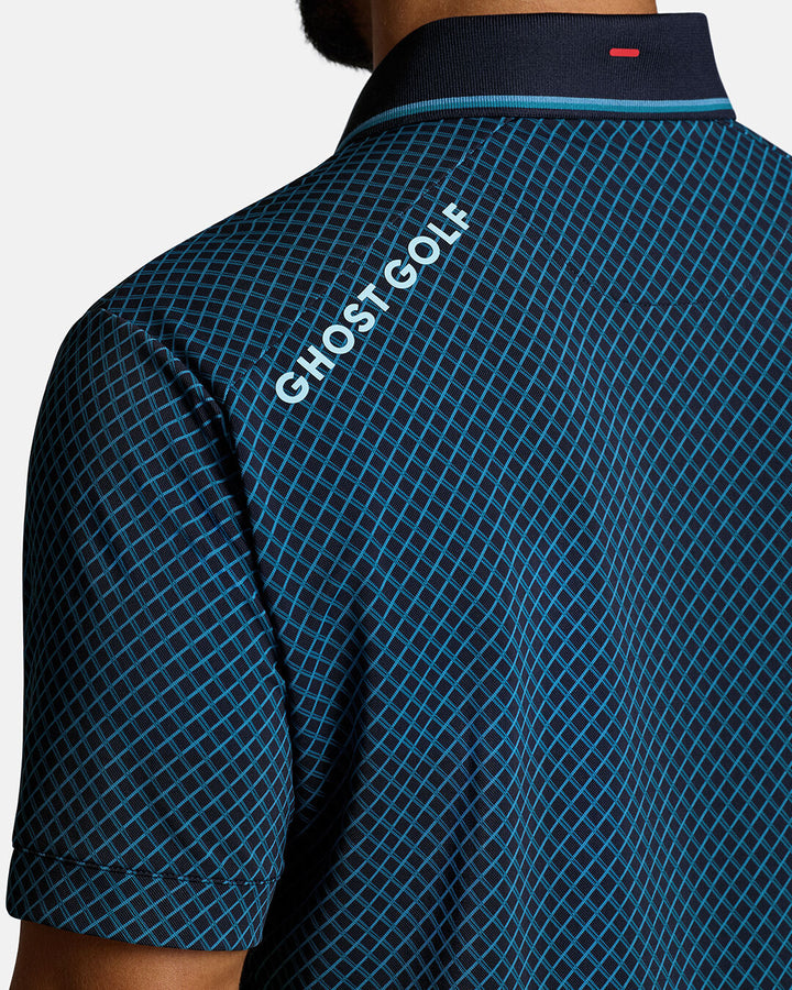 Closeup Back Shoulder Shot of Dark Navy Qualifier Chase Polo back of the polo showcasing ghost golf hit on left back shoulder #color_dark-navy