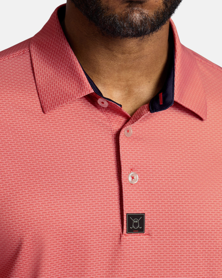 Closeup Front Shot of Red Qualifier Grid Polo showcasing buttons of polo and ghost golf icon #color_red