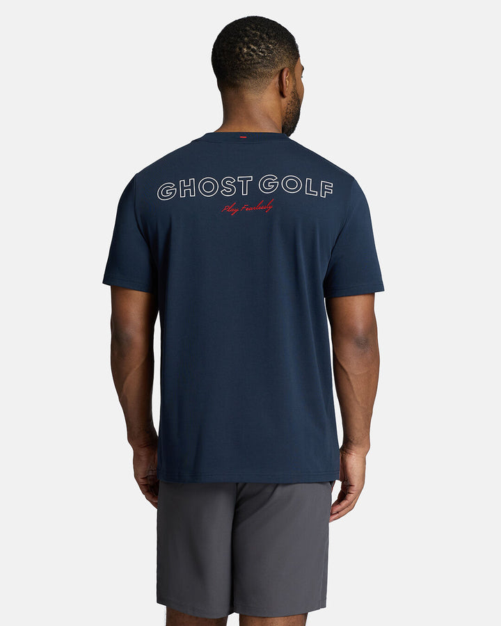 Top Back Body Shot of Black Male Model Wearing Dark Navy Qualifier Player Tee show casing typographic design on the back. Model is wearing grey shorts #color_dark-navy