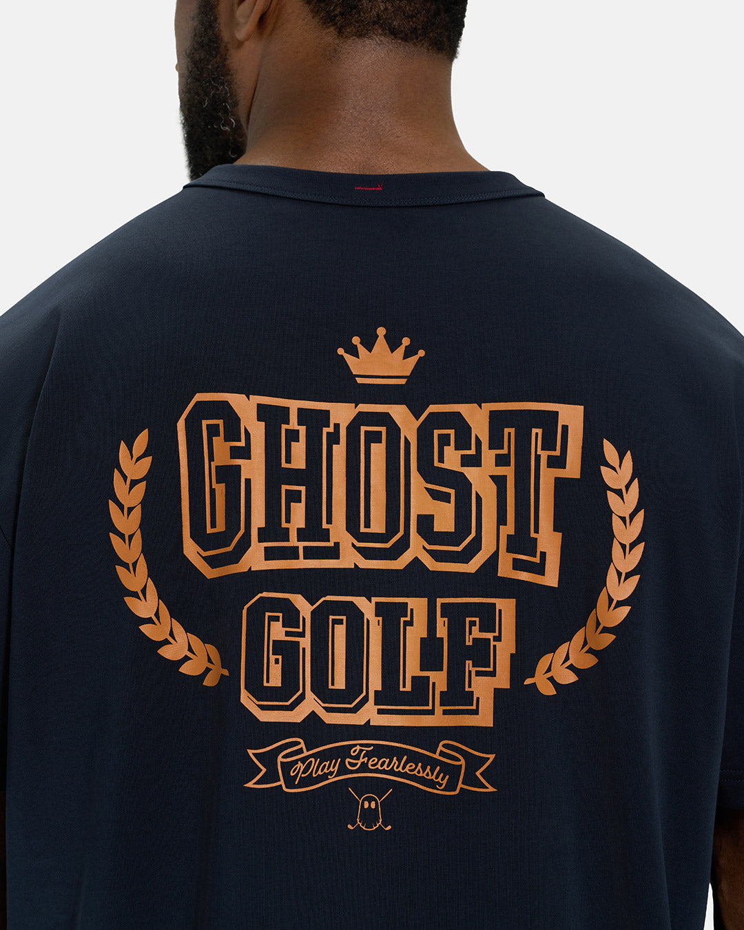 Back Closeup View of Navy Spectator Club Tee on Black Male Model with Ghost Golf Graphic #color_navy