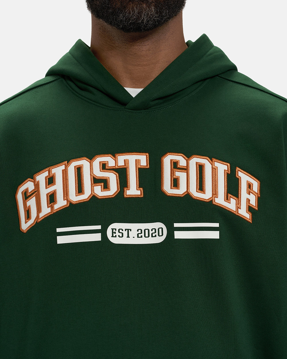 Front Closeup View of Bogey Green Spectator Dormie Hoodie on Black Male Model with Ghost Golf #color_bogey-green