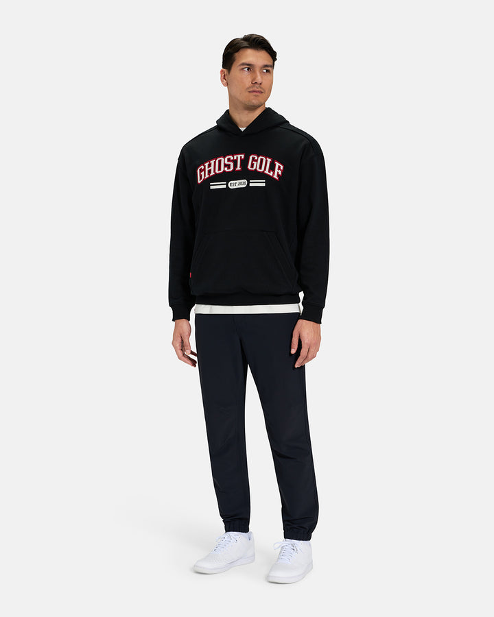 Full Body View of Black Spectator Dormie Hoodie on Asian Male Model wearing white tee black pants and white shoes #color_black