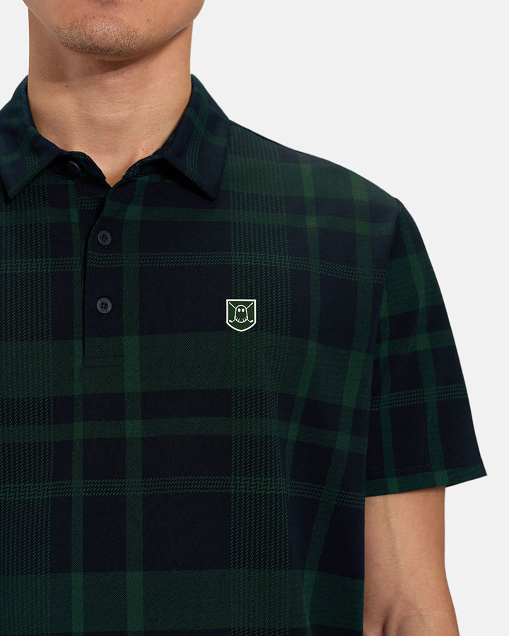 Front Closeup View of Bogey Green Spectator Stripe Polo on Asian Male Model with Ghost Icon Crest #color_bogey-green