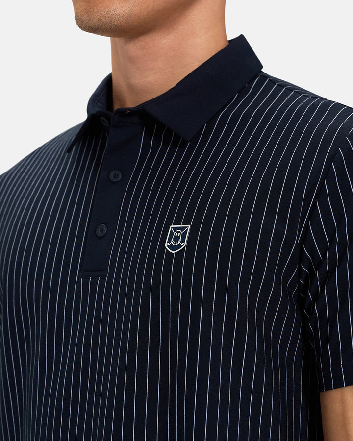Front Closeup View of Navy Spectator Stripe Polo on Asian Male Model with Ghost Icon Crest #color_navy