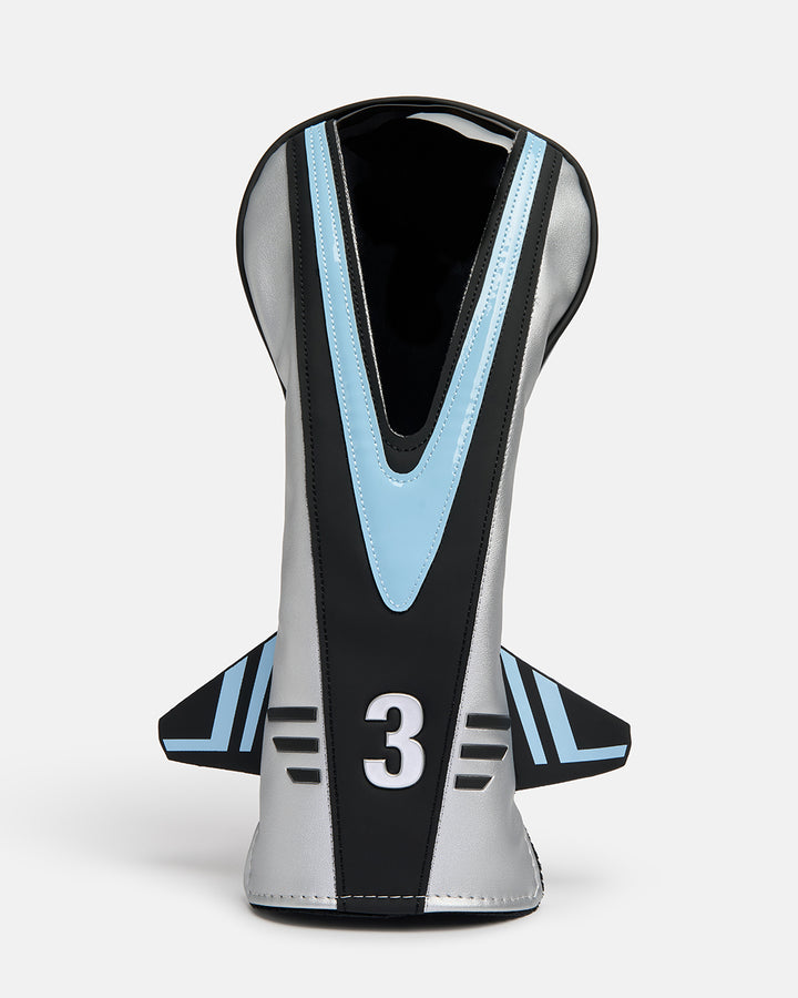 Front product shot of the Striker Primary 3 Wood Head Cover designed in the shape of a fighter jet. Features a clear viewing window at the top and an embroidered number "3" at the bottom of the cover. Front-facing image highlighting the aviation-inspired silhouette, premium construction, and distinctive Ghost Golf design details. #size_3-wood