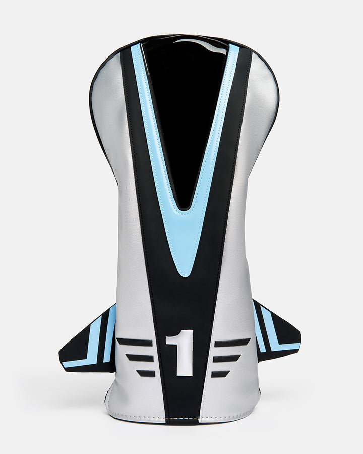 Front product shot of the Striker Primary Driver Head Cover designed in the shape of a fighter jet. Features a clear viewing window at the top and an embroidered number "3" at the bottom of the cover. Front-facing image highlighting the aviation-inspired silhouette, premium construction, and distinctive Ghost Golf design details. #size_driver