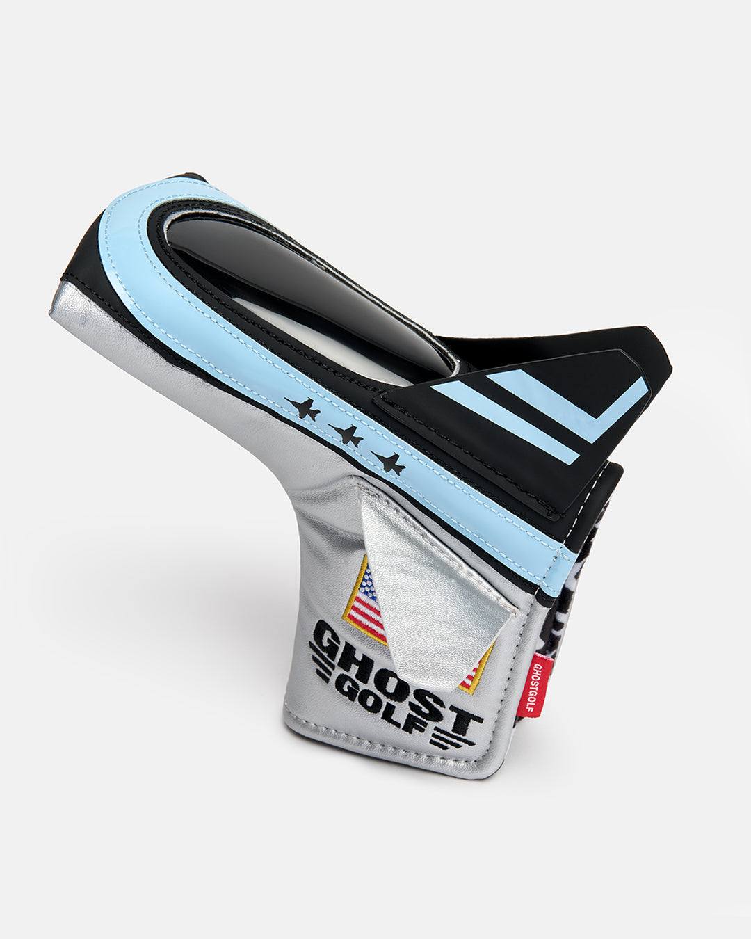 Side product shot of the Striker Blade Putter Cover designed in the shape of a fighter jet, featuring an embroidered Ghost Golf logo and USA flag. Angled profile view highlighting the aircraft-inspired silhouette, premium embroidery, patriotic detailing, and signature Ghost Golf craftsmanship.