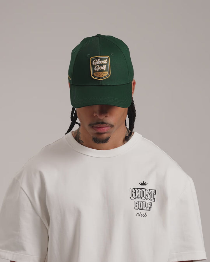 Male model showcasing Patrons Heritage Hat #color_bogey-green