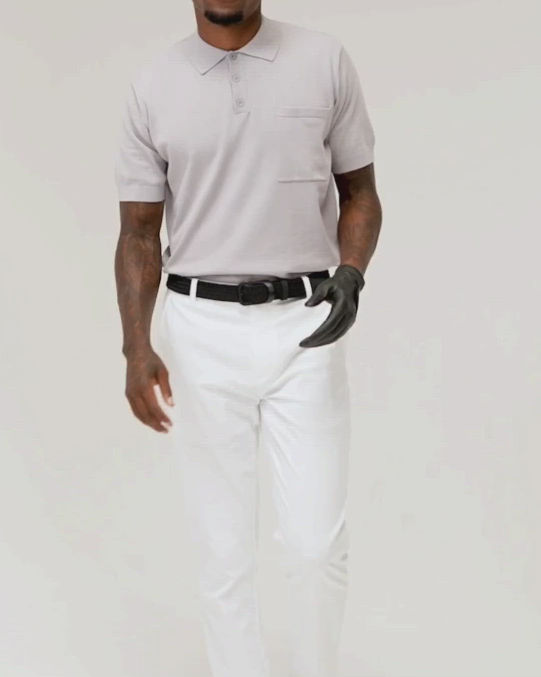 Ghost Golf Black Belt with Black Buckle and Black Leather Tail. Male Walking and Showing the belt. 